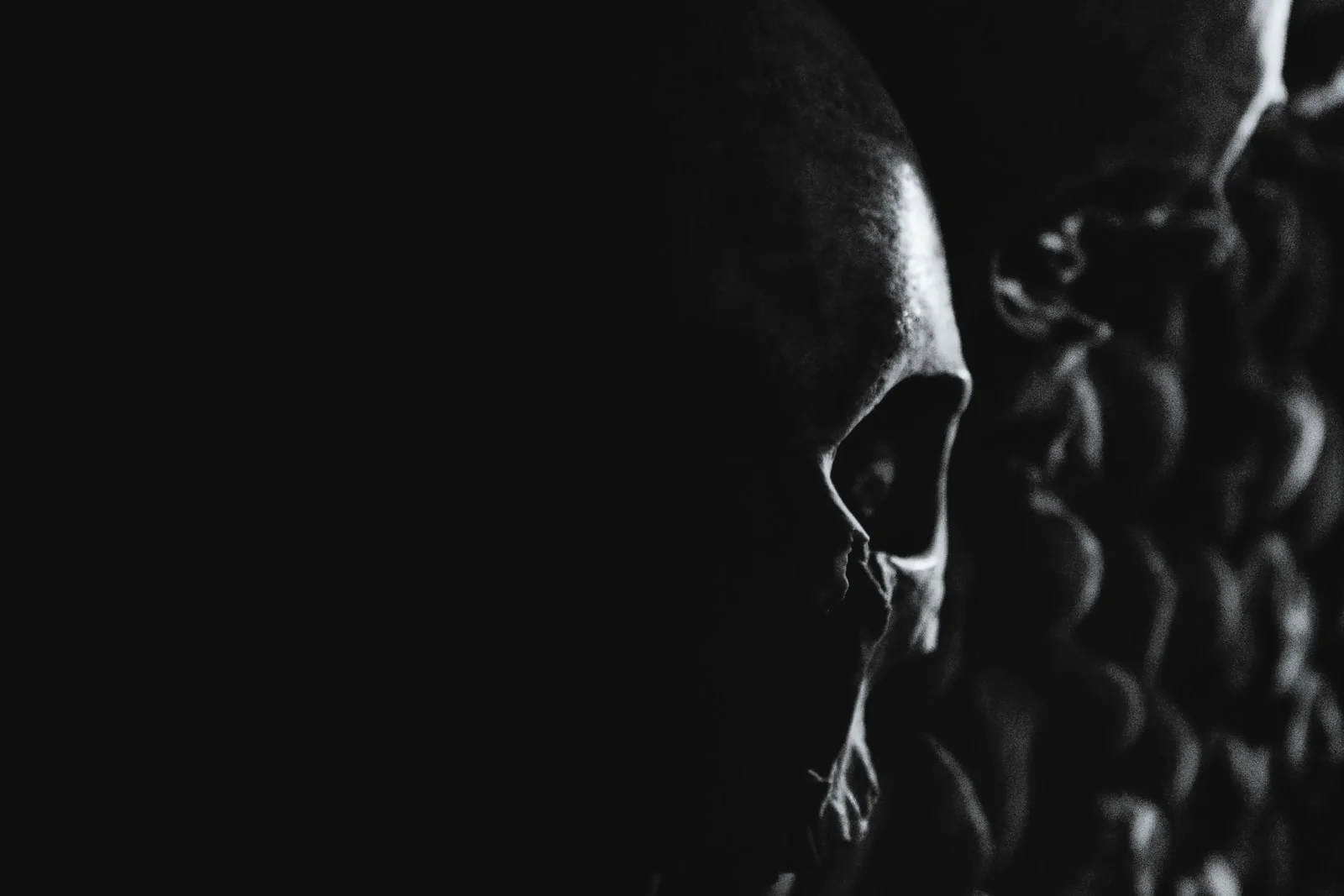grayscale photo of mans face